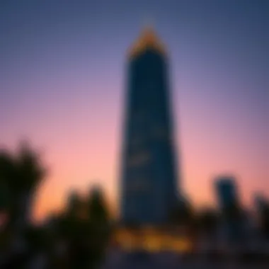 Crown Tower at sunset, showcasing its illuminated facade