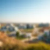 Scenic view of Aldar Reeman Living community showcasing modern architecture and lush landscapes