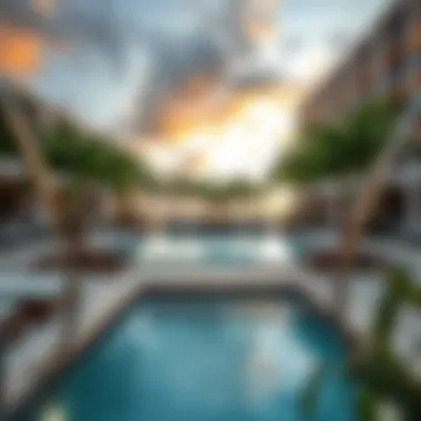 Luxurious pool area at Palm Beach Towers 3 with elegant lounge chairs