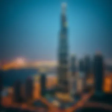 Night view of DaVinci Tower illuminated against the Dubai skyline